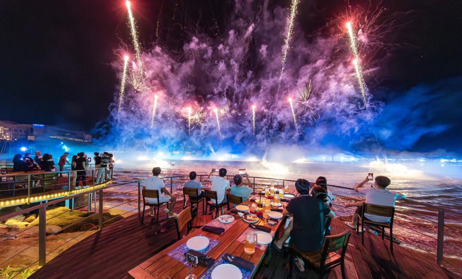 Tourists having a buffet dinner at Sun Bavaria restaurant while watching the Symphony of the Sea light show