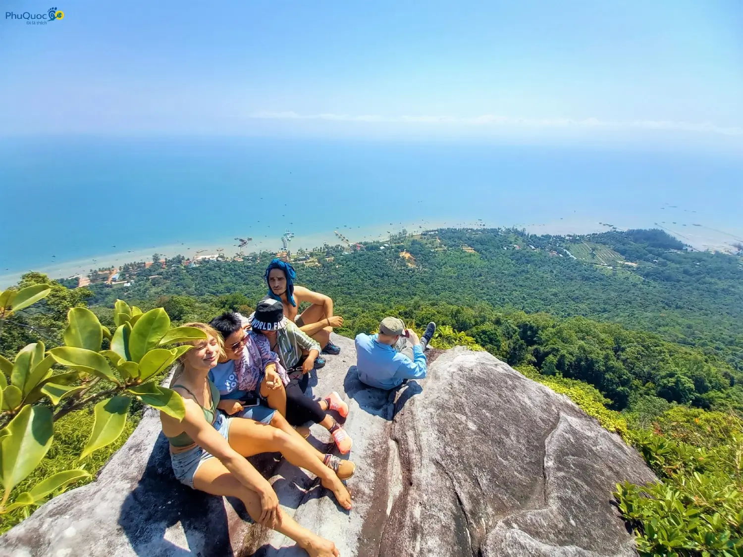 Rock ledge viewpoint 1 Da Bac Peak looking down at Bai Cay Sao and eastern sea of Phu Quoc